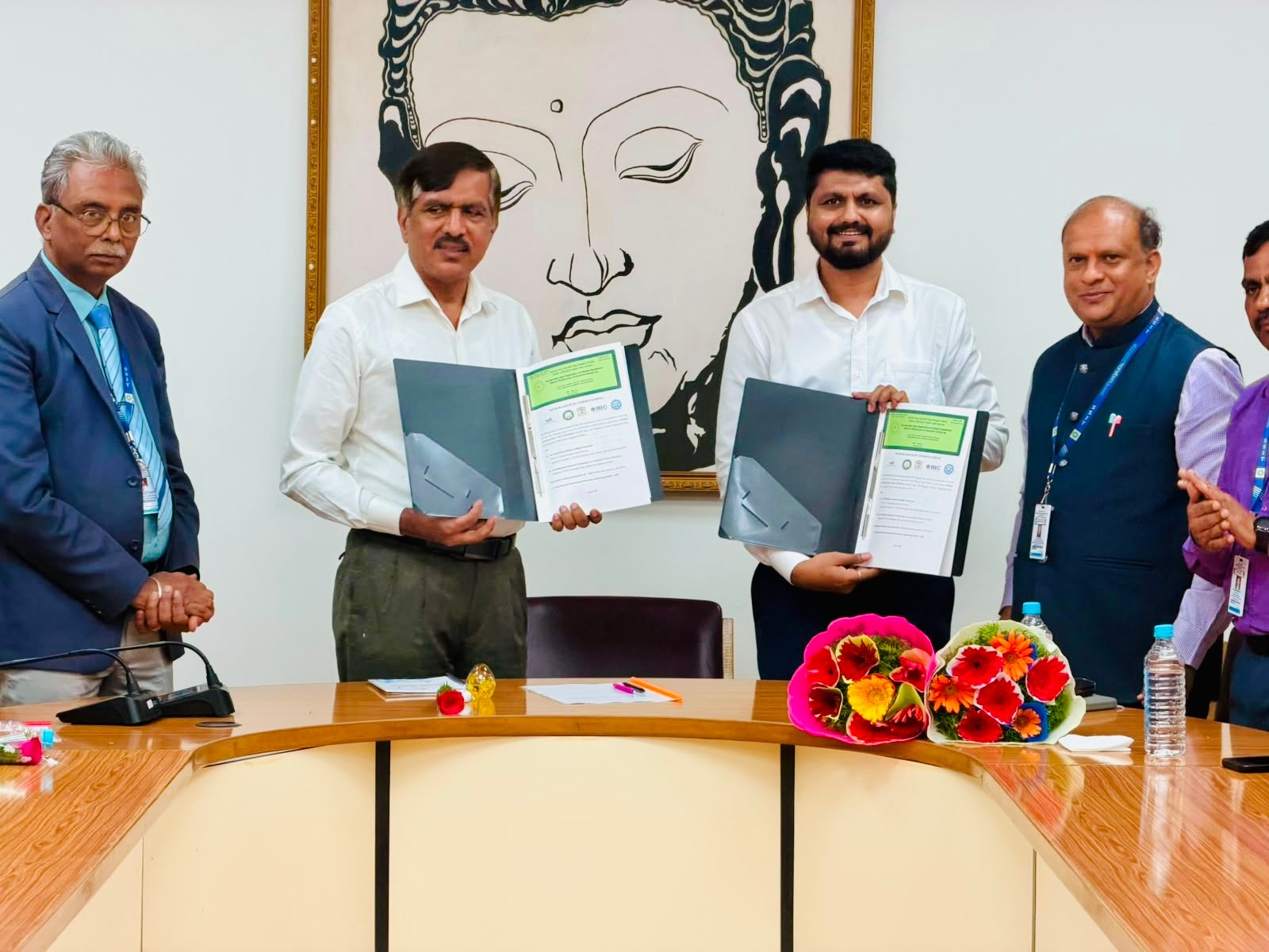 Exchange of MoU documents at Sri Siddhartha Academy